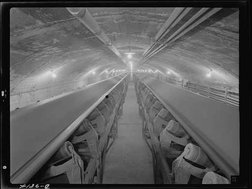 Production. Copper. Conveyor belts carrying copper ore through a tunnel at the Magna mill of the Utah Copper Company. Its plants at Magna and Arthur in Utah are treating vast quantities of the copper so vital for war purposes
