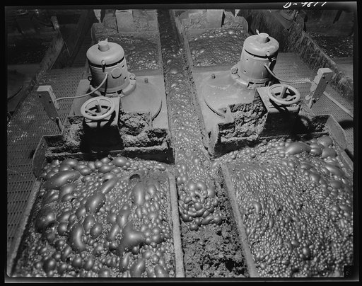 Production. Copper. Two flotation machines at the Arthur plant of the Utah Copper Company. The bubbles remove the fine particles of copper from the finely ground ore
