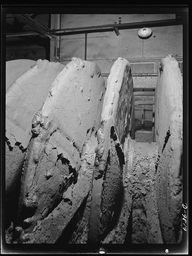 Production. Copper. A closeup of a disc-type filter showing how the dried copper concentrate is broken by expansion of the filter and then discharged. This filter unit is at the Arthur plant of the Utah Copper Company