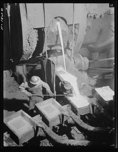 Production. Copper. Making molds of blister copper at the Garfield, Utah smelter of the American Smelting and Refining Company. Vast quantities of the copper so vital for war purposes are smelted at this plant