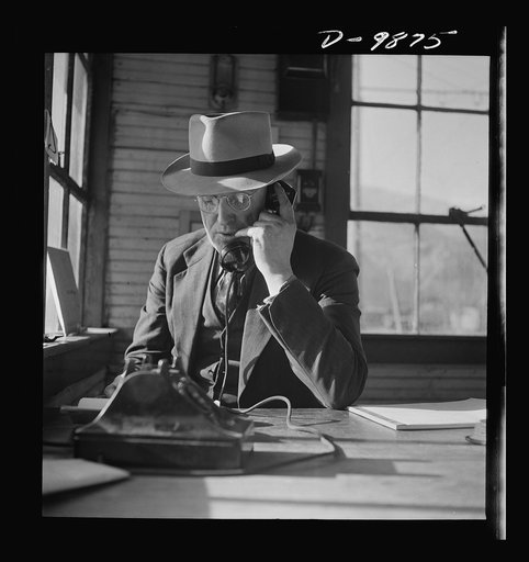 Utah Copper: Bingham Mine. One of the executives who keeps heavy ore production coming from the open-pit mining operations of Utah Copper Company at Bingham Canyon, Utah