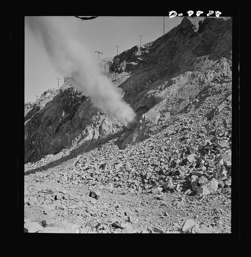 Utah Copper: Bingham Mine. Blasting at the open-pit mining operations of Utah Copper Company at Bingham Canyon, Utah