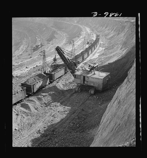 Utah Copper: Bingham Mine. Loading copper ore at the open-pit mining operations of Utah Copper Company, at Bingham Canyon, Utah