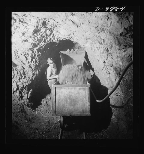 Production. Mercury. Loading mercury ore into a mine car with a mechanical loader. At the New Idria, California plant of the New Idria Quicksilver Mining Company, triple-distilled mercury is produced from cinnabar, an ore containing sulphur and mercury, mined at a number of workings near the plant