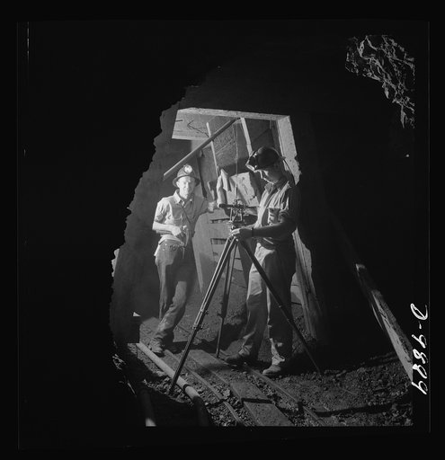 Production. Mercury. Surveying crew running lines in a mercury mine of the New Idria, California Quicksilver Mining Company. Triple-distilled mercury is produced from cinnabar, an ore containing sulphur and mercury mined at a number of workings near the plant
