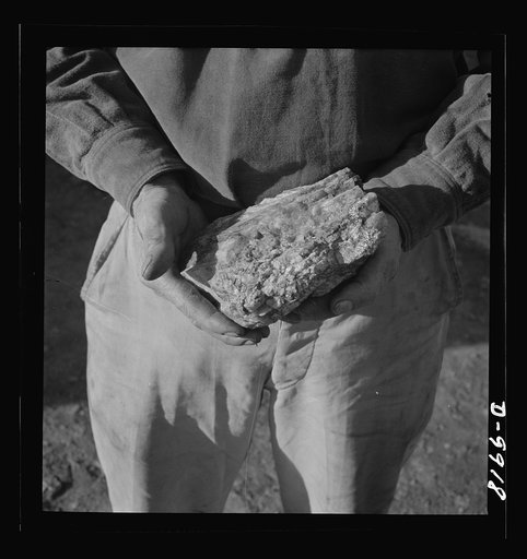 Production. Tungsten. A piece of tungsten ore mined near Kingman, Arizona and to be processed at a nearby recovery plant. The Boriana mine and plant at this point are producing large amounts of tungsten, for which there are many vital uses in the war effort. Boriana Mine, Arizona