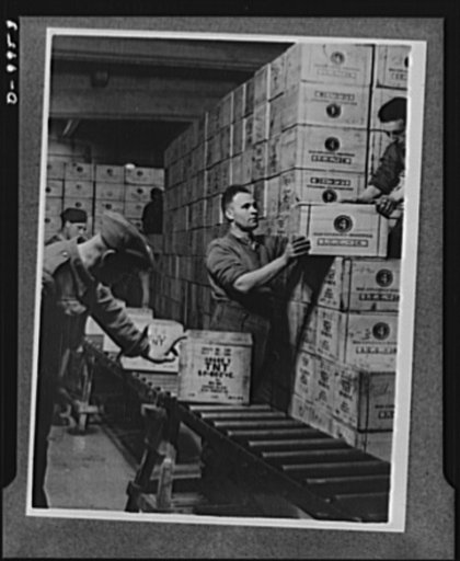 Lend-lease to Britain. Cases of TNT gun powder shipped from the United States under lend-lease are stacked in the dump in a tunnel one hundred feet underground dug out of solid rock, in western England. The staff here works twenty-four hours a day handling lend-lease materials arriving from the Unit