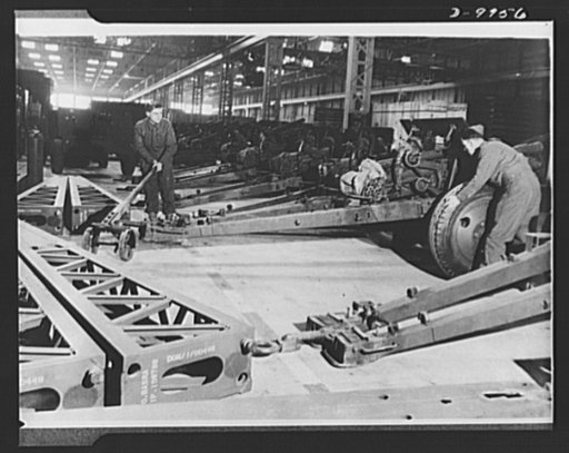 Lend-Lease to Britain. Shipment of 75 mm. guns from the United States as part of a lend-lease shipment reaches an ordnance depot in the English Midlands and are prepared for service