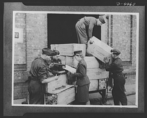 Lend-Lease to Britain. Cases of American-made automatic rifles shipped from the United States to England as lend-lease are unloaded at the railroad on arrival in England