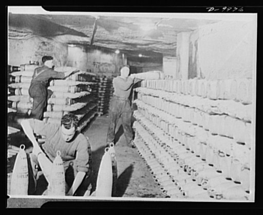 Lend-Lease to Britain. American-made 155 mm. shells shipped from the United States as lend-lease are stacked in an ammunition dump hewn from solid rock one hundred feet below the surface in England