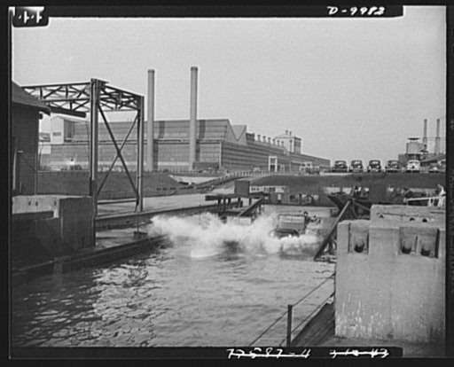 Sea jeeps. This amphibian car hits the water with a splash during a try-out at the Ford Motor Company's Rouge plant. All of the cars are water-tested in this slip before they are turned over to the government for use on various war fronts