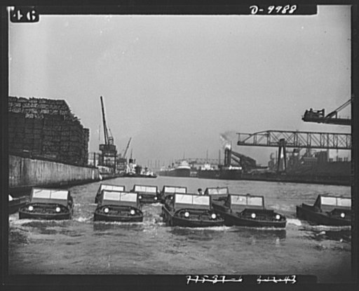 Sea jeeps. A "squad" of nine Ford-built amphibian cars in formation "swimming" in the Rouge River near the company's plant