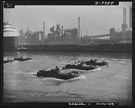 Sea jeeps. This picture shows the Ford amphibian reconnaissance car in test at the Ford Motor Company's Rouge plant and in the Huron River. The photo shows tests of the land-water cars in the Rouge River slip
