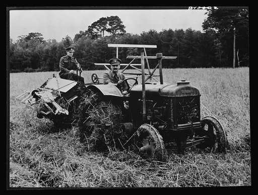 Food in England. Soldiers in Northern Ireland work with a tractor and harvester to cut a ten-acre field of oats. Many British soldiers, without previous farm experience have been released for temporary emergency farm work and have helped to ease the farm labor shortage