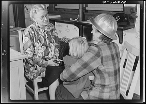 War workers' nursery. Mrs. Arlene Corbin, time checker in a Richmond, California shipyard brings two-and-a-half-year-old Arlene to a nursery school every morning before going home to sleep. Mrs. Corbin works on the midnight to 7:30 a.m. shift and relies upon the school to keep her daughter busy and 