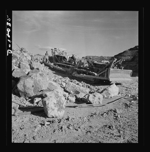 Production. Copper. Bulldozer operator at open-cut copper mine of the Phelps-Dodge Mining Company at Morenci, Arizona, supplying great quantities of the copper so vital in our war effort