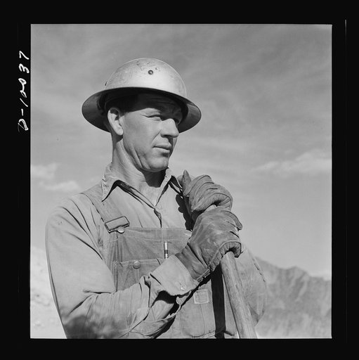 Production. Copper. Bulldozer operator at open-cut copper mine of the Phelps-Dodge Mining Company at Morenci, Arizona, supplying great quantities of the copper so vital in our war effort
