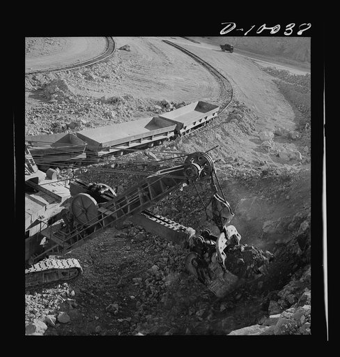 Production. Copper. Electric shovel in operation at open-cut copper mine of the Phelps-Dodge Mining Company at Morenci, Arizona, supplying great quantities of the copper so vital in our war effort