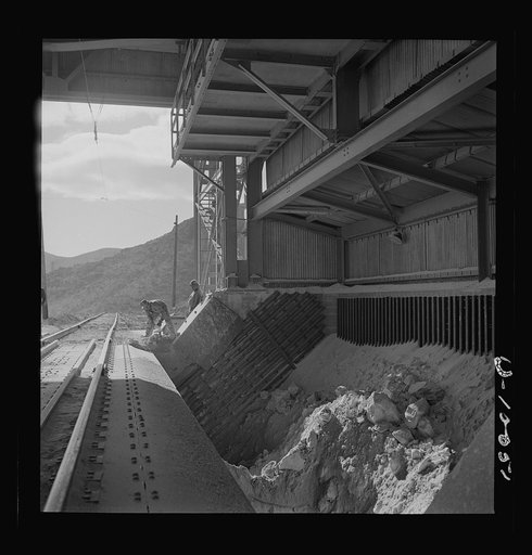 Production. Copper. Ore car dumper and grizzles at copper concentrator at the Phelps-Dodge Mining Company, Morenci, Arizona. This plant is supplying great quantities of the copper so vital in our war effort