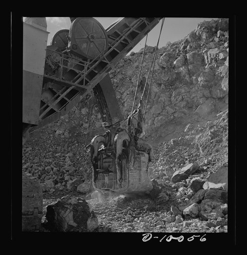 Production. Copper. Loading copper ore from an open-cut mine of the Phelps-Dodge Mining Company at Morenci, Arizona. This plant is supplying great quantities of the copper so vital in our war effort