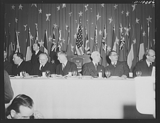 Maxim Litvinov, Russian ambassador; Vice-President Henry A. Wallace; lend-lease administrator Edward R. Stettinius, Jr., and T.V. Soong, Chinese foreign minister, eat dehydrated food at luncheon in observance of the second anniversary of lend-lease, at the Hotel Statler, Washington, D.C., on March 1