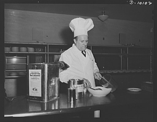Chef preparing dehydrated food for luncheon served to commemorate second anniversary of lend-lease, on March 11, 1943, at Hotel Statler, Washington, D.C.