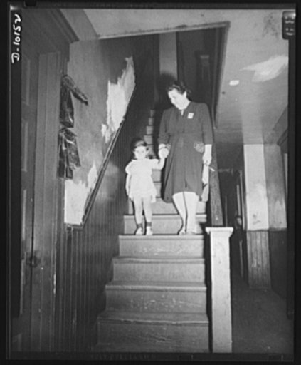 War nursery schools. New Haven, Connecticut. Mrs. Theresa De Carlo, worker in a New Haven munitions plant and her daughter Judith, leave for a nursery where Judith will remain until her mother calls for her on her return from work
