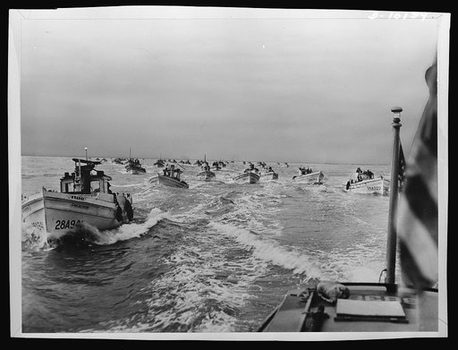 A Coast Guard motor lifeboat provides escort to San Francisco's crab fishermen as a wartime precaution. This naval protection includes taking the fleet to the fishing grounds at dawn, remaining with it through the fishing hours and finally bringing it home through the Golden Gate in the late afterno