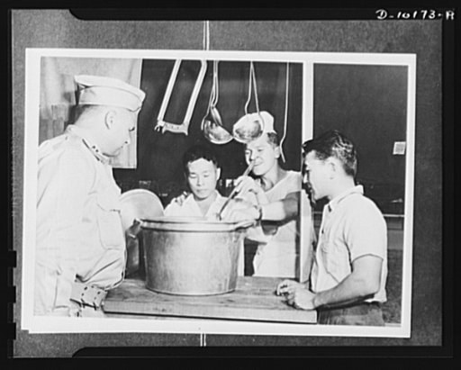 Japanese-American volunteers. This is the Army, Shuichi "Pete" Sakamoto, surveyor and civil engineer, and Bill Shiramizu of Hanamaulu, are told by Captain C.J. White, commanding officer of the provisional company of AJA (Americans of Japanese ancestry) volunteers on Kauai, as they spend their first 