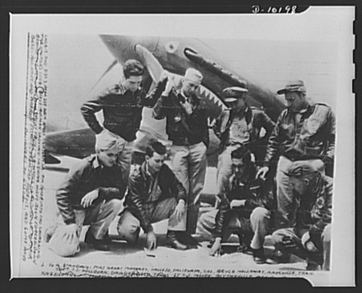 "The Walkers Club." Eight U.S. airmen in China who were forced down behind the Japanese lines. After a period of eight weeks and many narrow escapes of contacts with enemy patrols, they reached their bases. Left to right, standing: Major Grant Mahoney, Vallejo, California; Colonel Bruce Hollaway, Kn