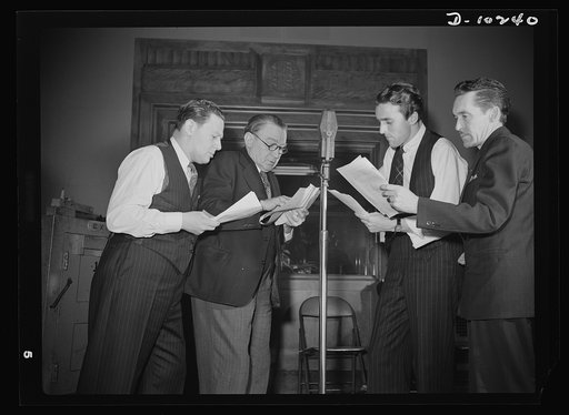 "You Can't Do Business With Hitler." Rehearsing for the radio show "You Can't Do Business With Hitler" are (left to right) Abrasha Robofsky, Colonel Charles Ferris, John Flynn, and Robert Pollard. This series of programs is written and produced by the radio section of the Office of War Information (