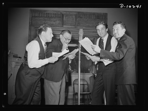 "You Can't Do Business With Hitler." Rehearsing for the radio show "You Can't Do Business With Hitler" are (left to right) Abrasha Robofsky, Colonel Charles Ferris, John Flynn, and Robert Pollard. This series of programs is written and produced by the radio section of the Office of War Information (