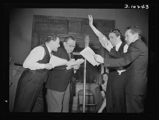 "You Can't Do Business With Hitler." Rehearsing for the radio show "You Can't Do Business With Hitler" are (left to right) Abrasha Robofsky, Colonel Charles Ferris, John Flynn, and Robert Pollard. This series of programs is written and produced by the Office of War Information (OWI)