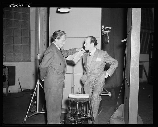 Spencer Tracy, narrator and Garson Kanin, director, at the Long Island Studios of the Army Signal Corps for the recording of Spencer Tracy's narration of the "Ring of Steel," an Office of Emergency Management film (OEM), on February 19th, 1942
