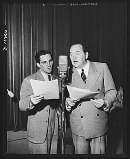 Three Thirds of the Nation. Howard McNeer and Edward Arnold during rehearsal of the War Production Board (WPB) radio program "Steel." McNeer played the automobile which wished it was a jeep