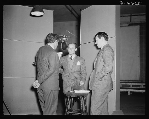 Spencer Tracy, narrator, Garson Kanin, director, Wallace Russell, writer, at the Long Island Studios of the Army Signal Corps for the recording of Spencer Tracy's narration fo the "Ring of Steel," and Office of Emergency Management (OEM) film, on February 19, 1942