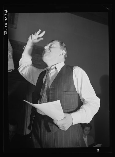 "You Can't Do Business With Hitler." You might guess from his gestures that Abrasha Robofsky is rehearsing for his portrayal of Adolf Hiter in "You Can't Do Business With Hitler," radio show written and produced by the radio section of the Office of War Information (OWI)
