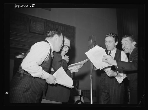"You Can't Do Business With Hitler." Rehearsing for the radio show "You Can't Do Business With Hitler" are (left to right) Abrasha Rbofsky, Colonel Charles Ferris, John Flynn, and Robert Pollard. This series of programs are written and produced by the radio section of the Office of War Information (