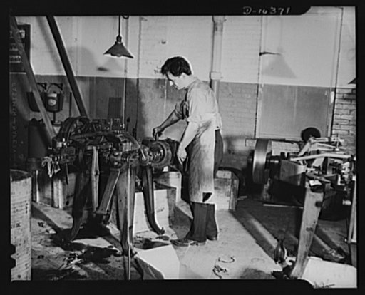 Left, operator attends rebuilt automatic cotter pin making machine formerly used to make bobby pins. Right, machine being rebuilt to produce cotter pins