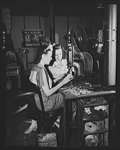 Girl workers of the "V-12" Company producing copper connecting tubes for Gosport sets