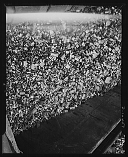 Close-up of tons and tons of empty tin cans collected from houses and factories throughout the city of New York in the war salvage drive