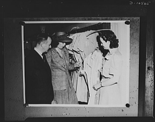 Volunteer woman investigator for the Office of Price Administration (OPA) enforcement agency in Philadelphia, one of three cities selected in a test drive to discover violations of rationing and ceiling prices, in a department store checking prices of women's apparel. All investigators were required