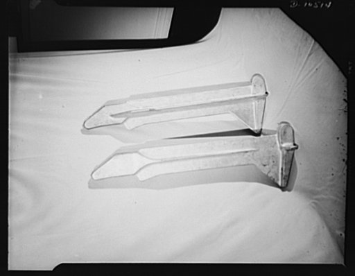 The parts shown are aluminum supports for plane wings. These are made under subcontract by a small New York manufacturing plant