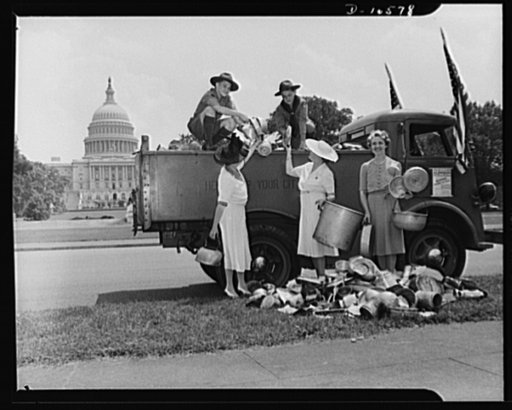 Three women (including Senator Margaret Chase Smith) and two Boy Scouts with a truck of tin-ware collected for war use. Placed in front of the Capitol building, Washington, D.C.