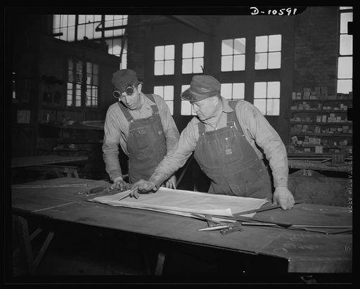 Denver, Colorado. Two ingenious American steel fabricators who "took a quick look at a blue print and in less time than it takes to tell it" turned from making steel guard rails for a gold mine shaft to building parts for Navy escort vessels