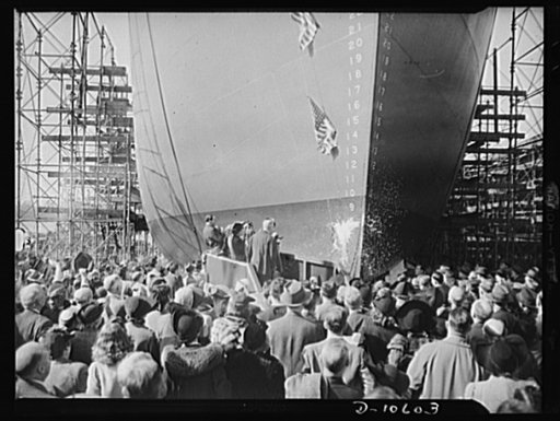 Launching of 10,000 ton ships. The first of 90 sister ships to be built for the Maritime Commission slides off the dock into the Atlantic. Launched just one year from the time construction work started on the shipyards, this 10,000 ton vessel is of the "Virginia Dare" type. In the future these ships