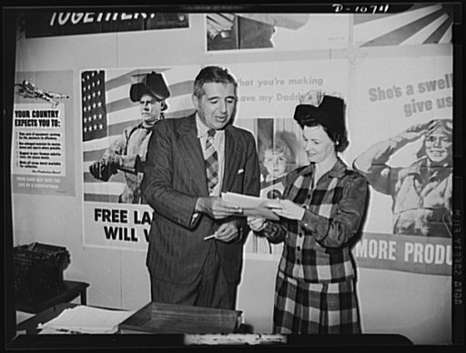 Left to right: Michael W. Straus, Chief, War Production Drive Headquarters, and Mrs. Marie McPherson, Chairman, Labor-Management Committee, Meissner Manufacturing Company, Mt. Carnel, Illinois