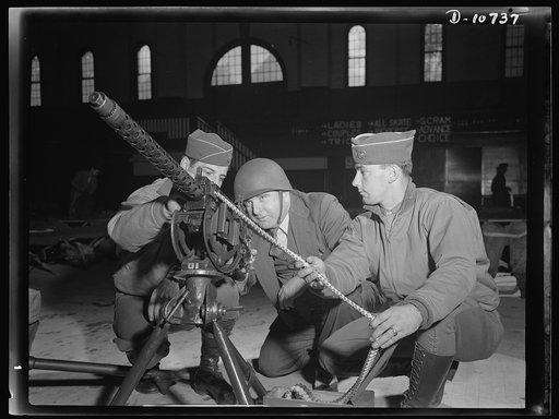 War production drive. Anthracite rallies. Soldiers taught a coal miner how to operate a machine gun at an anthracite rally, one of four held in Eastern Pennsylvania from September 28th through October 1st. Servicemen and miners attended the rallies and saw what each was contributing toward winning t