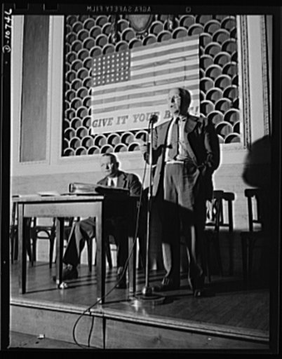 Richard Maize, Secretary of Mines, State of Pennsylvania, speaking before labor-management committee members at Scranton, July 29th. Michael J. Kosik, seated
