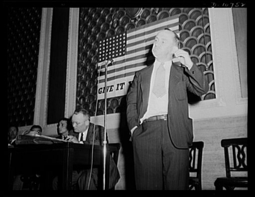 Mart F. Brennan, Acting District President, United Mine Workers of America, and Regional Representative of UMWA for anthracite, speaking before labor-management committee members at Scranton, July 29th. Seated, Michael J. Kosik